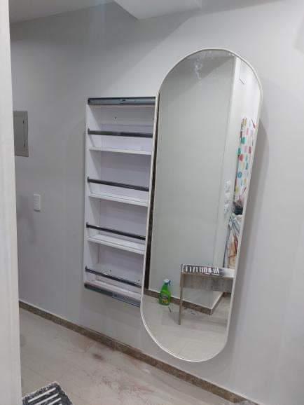A Shoe cabinet with a commode