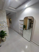 Load image into Gallery viewer, A shoe cabinet with a mirror
