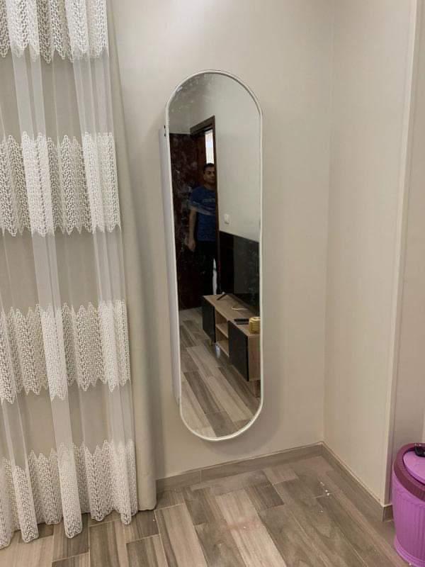 Ironing wall unit with mirror.